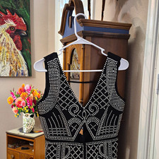 Geometric Stud One Peice Short. Zip Back. Size Med Tag shows Large but Appears M