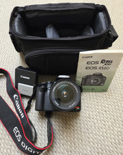 Canon EOS Rebel XSi 450D Digital SLR Camera with lens, case, book and battery