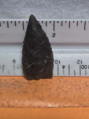 Authentic Paleo Agate basin point made of black chert from Cass co Mo.