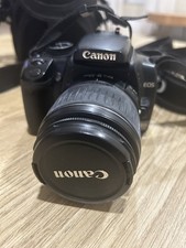 Canon EOS Rebel XTi 10.1MP Digital SLR Bundle Grip, Lens, Batteries, Case, Card