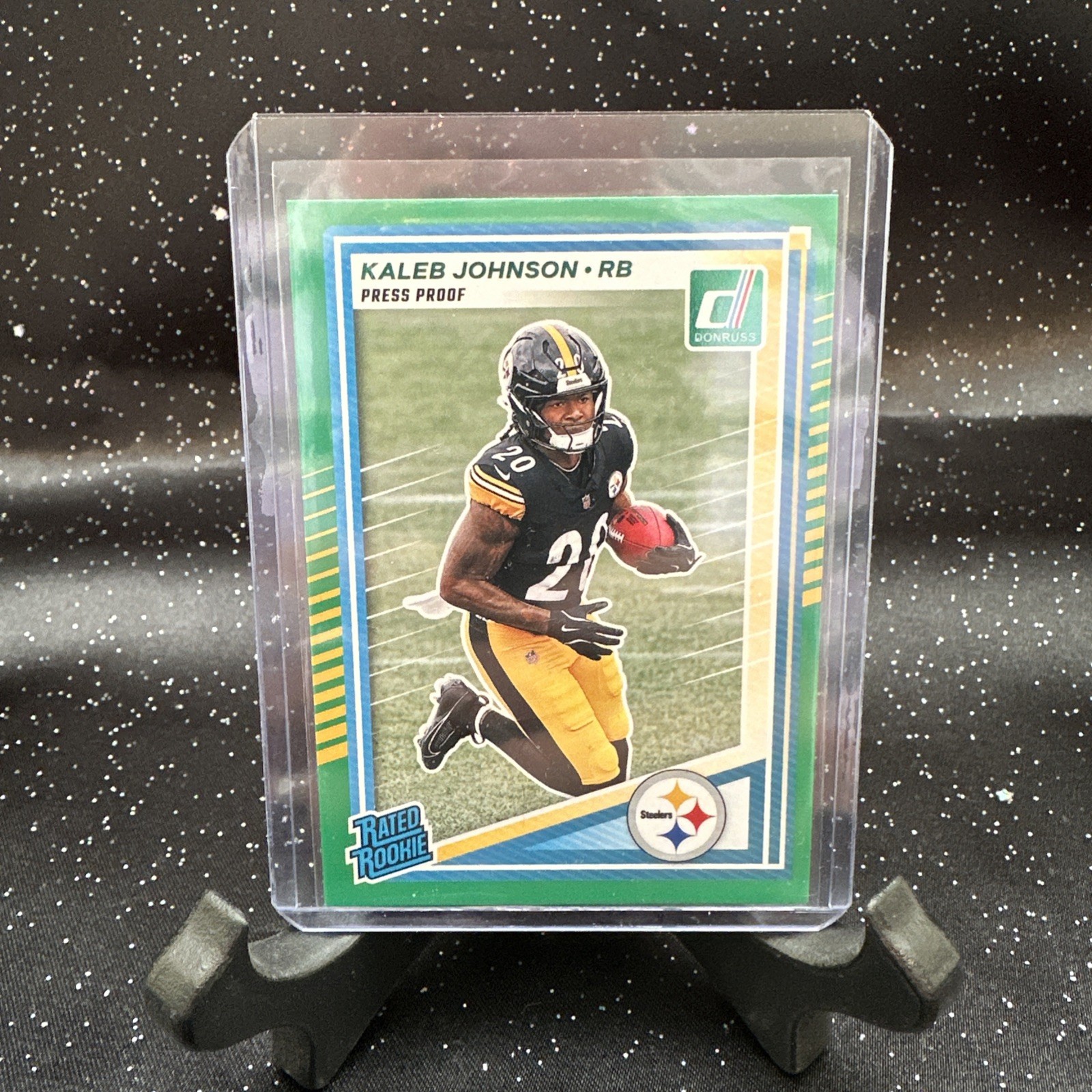 2025 Donruss Kaleb Johnson Green Press Proof Rated Rookie #322 Steelers
