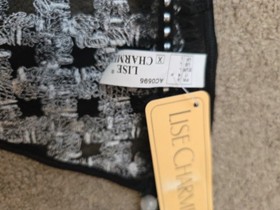 BRAND NEW LISE CHARMEL , BLACK & WHITE STRING THONG SIZE LARGE 