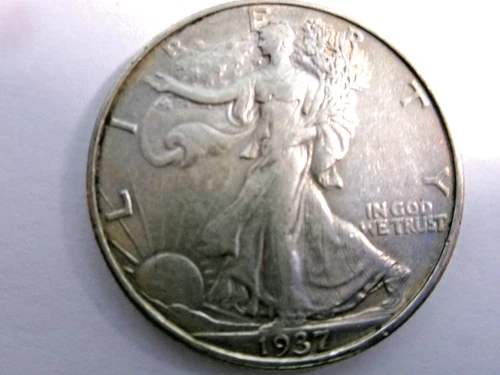Photo of a 1937-P Walking Liberty Half Dollar from an eBay listing that sold on Jul 18, 2026