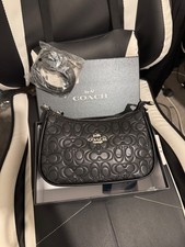 Coach Teri shoulder bag in black signature debossed leather with silver-tone har