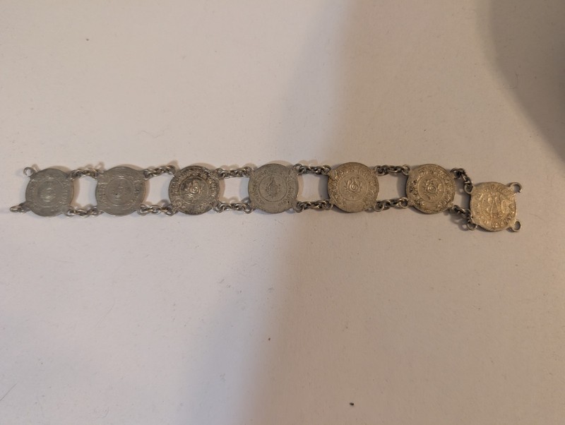 Chain with 7 silver One Fanam coins from Travancore 1940s