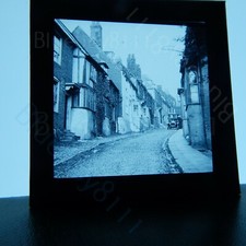 Village street early car edwardian magic lantern