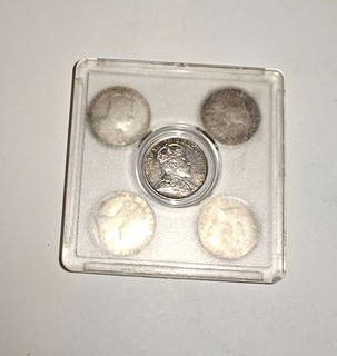 Older silver coin from Canada 1910 5 cents in protective case