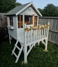 Tower Wooden Playhouse  Painted Stone. Less than a year in old in new condition