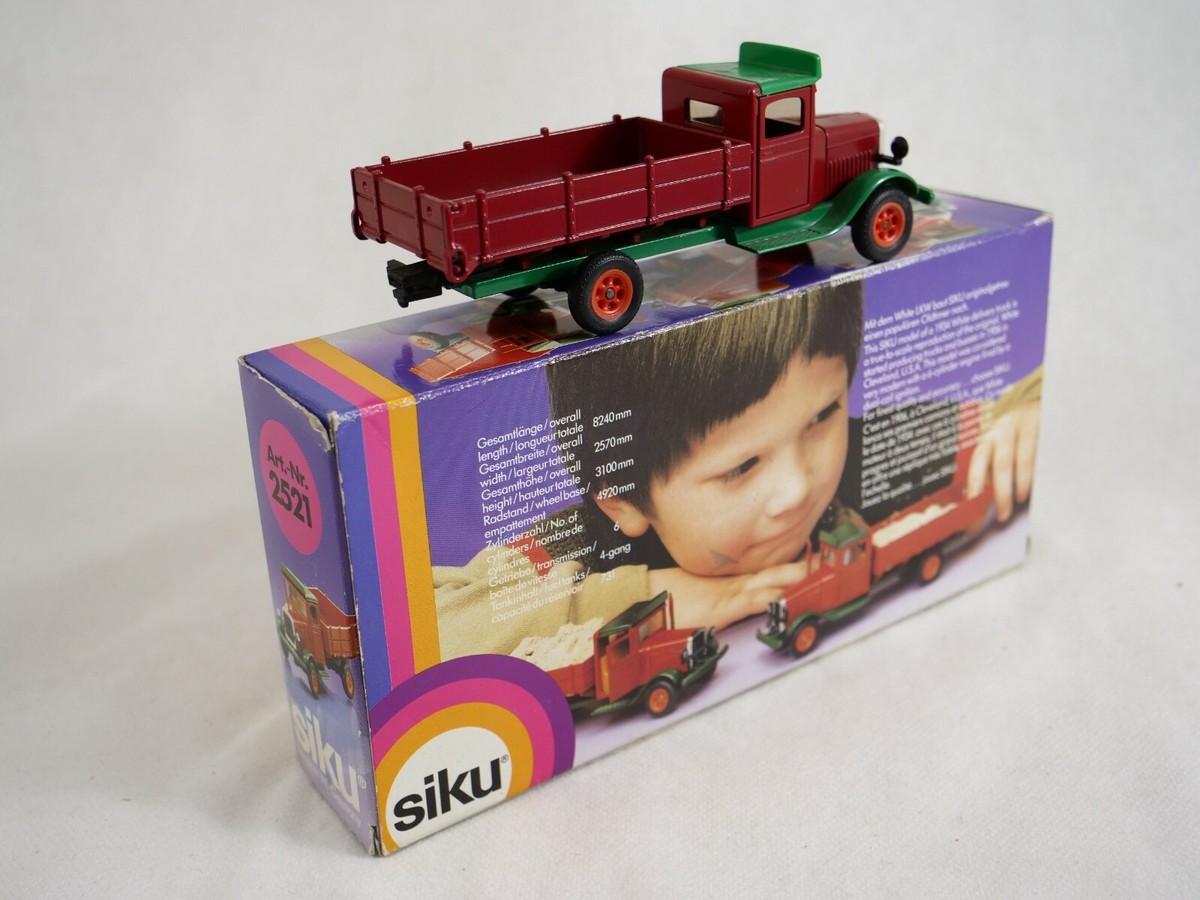 Siku V series 1625, truck M.A.N. VW flatbed, red scale 1:55