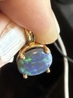 14k Yellow Gold Oval Black Opal Pendant 2.6g — photo 10