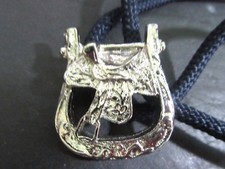 COWBOY SADDLE AND BUCKLE SILVER TONE VINTAGE BOLO TIE BLUE CORD
