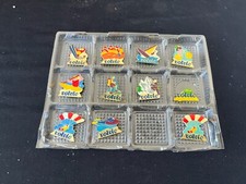 Lot de 12 pin’s publicitaires Volvic – sports et loisirs