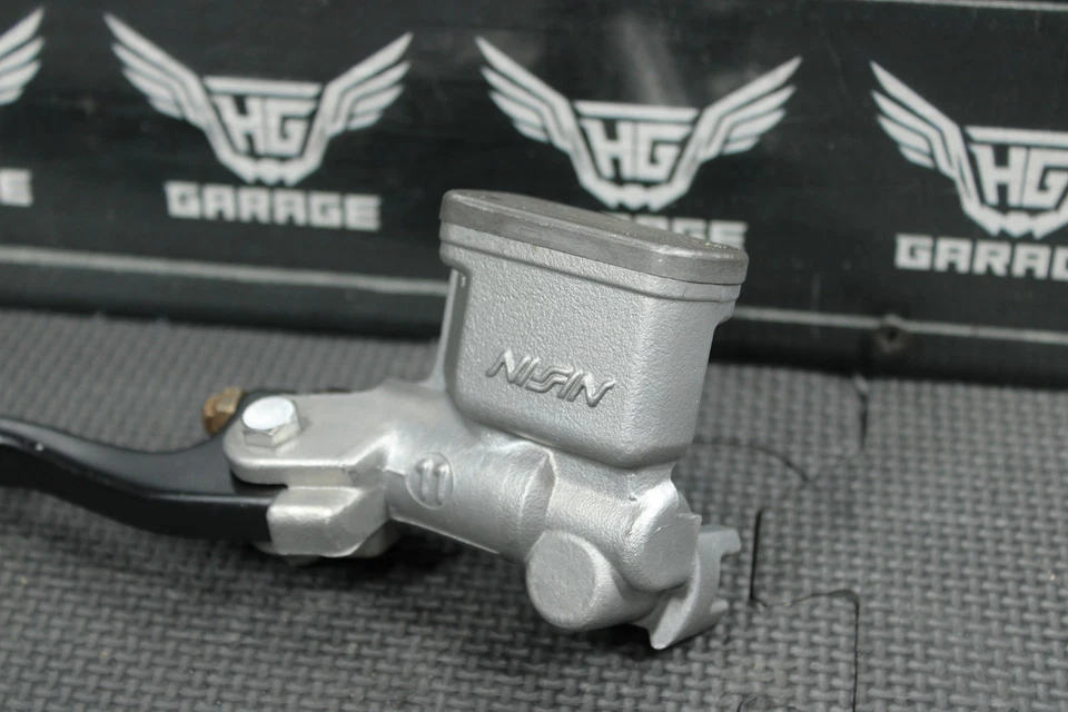 Honda CR125R 2005 OEM NISSIN FRENO DELANTERO CILINDRO MAESTRO CON PALANCA 455510-MEY-305 Foto 2 de 4