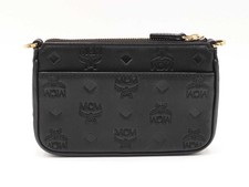 Mcm Aren Mini Crossbody Pouch In Black Monogram Embossed Leather Fw1125crdu