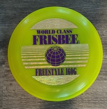 Wham-O - World Class Frisbee Freestyle - Transparent Yellow 160G