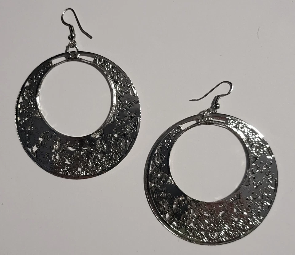 BOUCLES D'OREILLES COULEUR ARGENTE - Photo 1/1