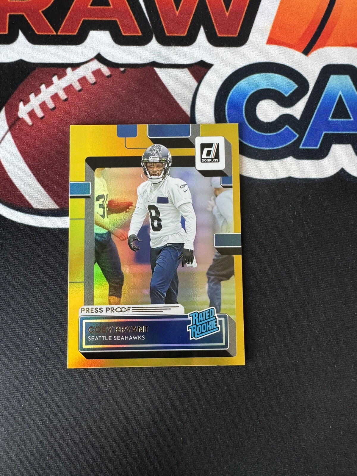2022 Donruss RATED ROOKIE - COBY BRYANT #394 Premium Gold Press Proof Seahawks
