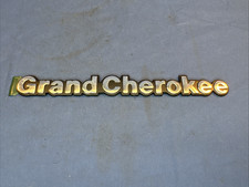 1993-1995 Jeep Grand Cherokee Side Fender Emblem Logo Letters Badge Oem Mopar 1993-1995 Jeep Grand Cherokee Side Fender Emblem Logo Letters Badge Oem Mopar