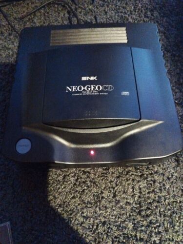 Console Neo Geo CD SNK neogeo Complète peritel et  transfo JGO et 🕹️  + 2 Jeux - Photo 1/13