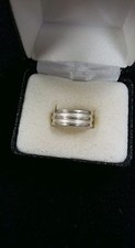 STERLING SILVER SIZE 7 RING WITH DESIGN CONTINUOUS AROUND BAND 4.3 GRAMS
