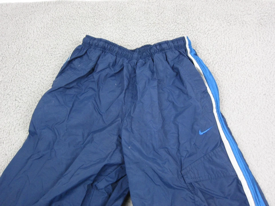 Pantalones NIKE Vintage Juveniles Extra Grandes XL Azul Atlético Años 90 Nylon Cortavientos Niños Foto 2 de 4