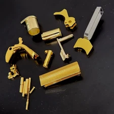 1911 Parts kit grip safety, Mainspring housing, Barrel Bushing, Plug Real Gold