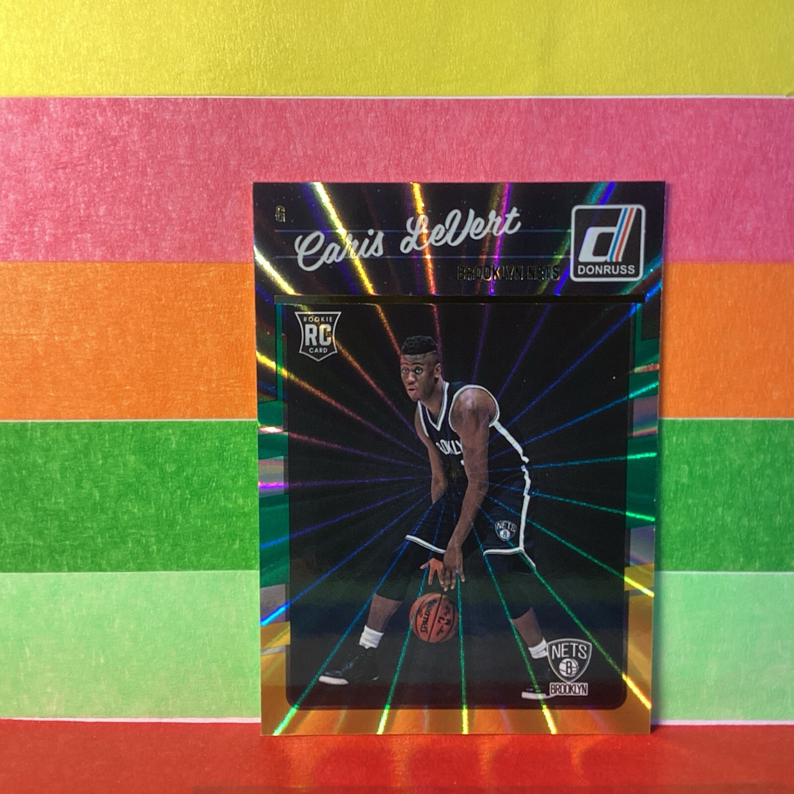 2016-17 Donruss Caris Levert #167 Green and Yellow Holo Laser Rookie Nets