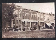 REAL PHOTO PEABODY KANSAS DOWNTOWN STREET SCENE STORES POSTCARD COPY