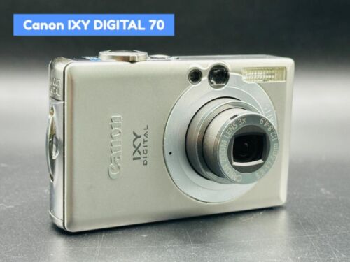 Canon IXY DIGITAL 70 Digital Camera SILVER Battery & charger Good - Afbeelding 1 van 9