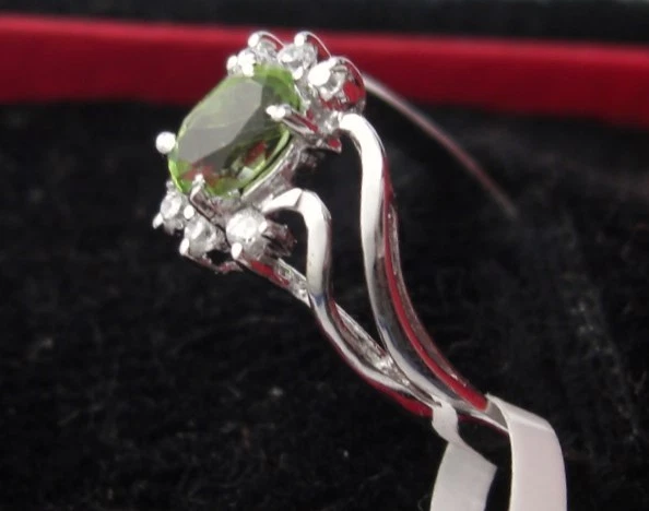 L37 PERIDOTO ANELLO ARGENTO 925 OVALE LEVIGATA CON ZIRCONIA Fiori Forma diverse - Immagine 4 di 4