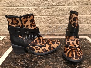donald pliner leopard boots