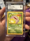 1999 Pokémon Base Set Unlimited Koffing #51/102 - CGC 9