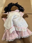 Vintage African American Cabbage Patch Kid doll, also known as a Little Person
