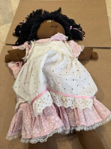 Vintage African American Cabbage Patch Kid doll, also known as a Little Person