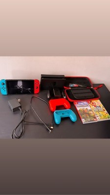 Nintendo Switch With Accessories , Games and Joy-Con Controllers
