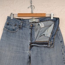Pantalones de mezclilla Levi's de colección para hombre 34x34 azul desteñido 527 corte bota baja ajustados desgastados Y2K