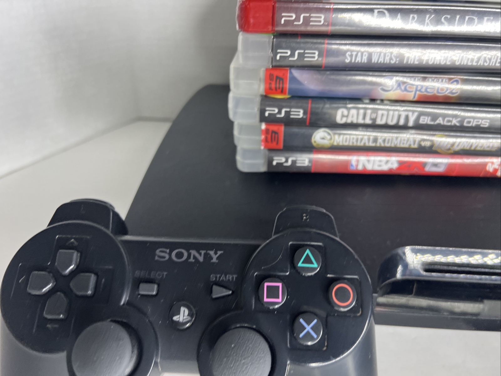 Sony PlayStation 3 Slim bundle With Games And Controller And Wires