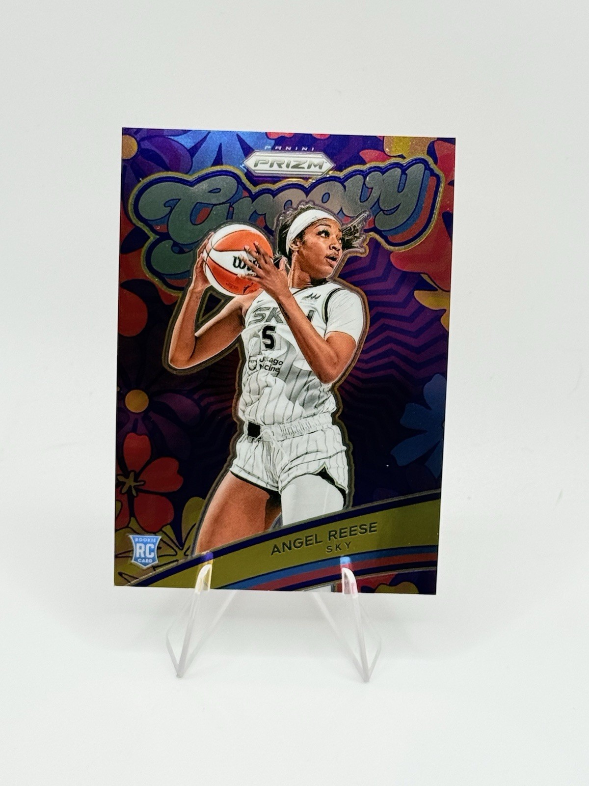 Angel Reese #12 Basketball Cards 2024 Panini Prizm WNBA Groovy trading card — raw and PSA graded price guide
