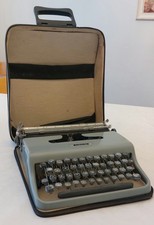 Olivetti lettera 22 portable typewriter with case