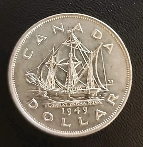 THE OLD CANADA  COMMEMORATIVE 🇨🇦 SILVER ONE DOLLAR 1949- GEORGE VI.