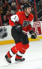 Mike Rathje Philadelphia Flyers skates at the NHL game with - Ice Hockey Photo