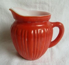 HAZEL ATLAS  GLASS RIBBED BRIGHT ORANGE SMALL SYRUP OR CREAM  PITCHER  