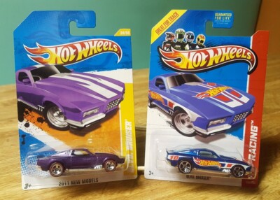 Hot Wheels Blvd. Bruiser 1:64 Lot of 2 Purple w/ Redlines & Blue
