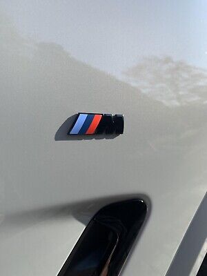 Kopen 2x Original BMW M Kotflügel Emblem Schwarz 45x15 51145A4B372 Selbstklebend NEU
