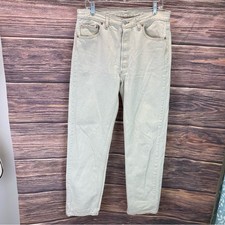 VTG Levi’s 553 mens jeans made in USA measures 32X32. Beige/tan