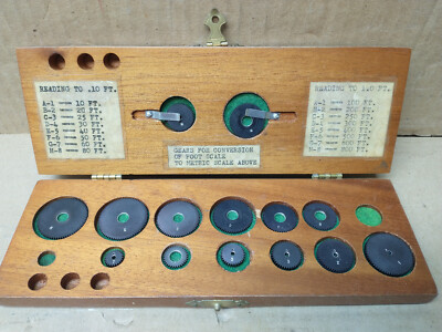 vintage box of gears for drafting or surveying instrument - planigraph?