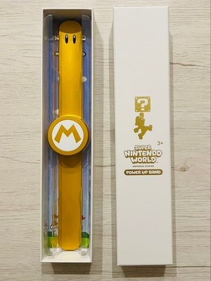 Super Nintendo World Power Up Band Mario GOLD limited edition from