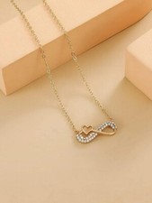 Gold Colored Rhinestone Infinity Necklace With a Heart