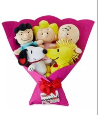 Bouquet of Peanuts Snoopy stuffed animals.