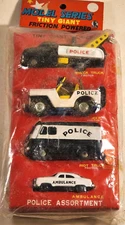 VINTAGE SSS MODEL SERIES TINY GIANT FRICTION POWERED POLICE ASSORT. in PACKAGE